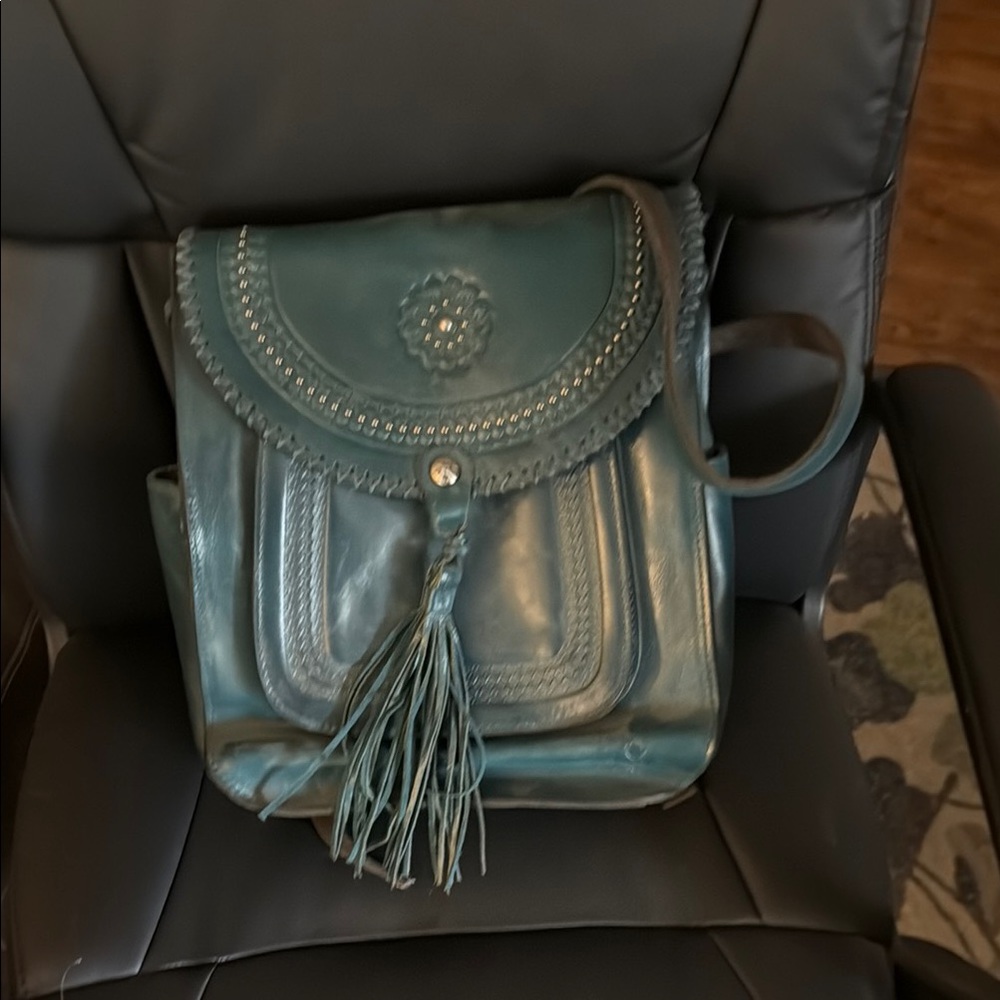 Patricia Nash Blue Backpack with Tassel and Stud Accents